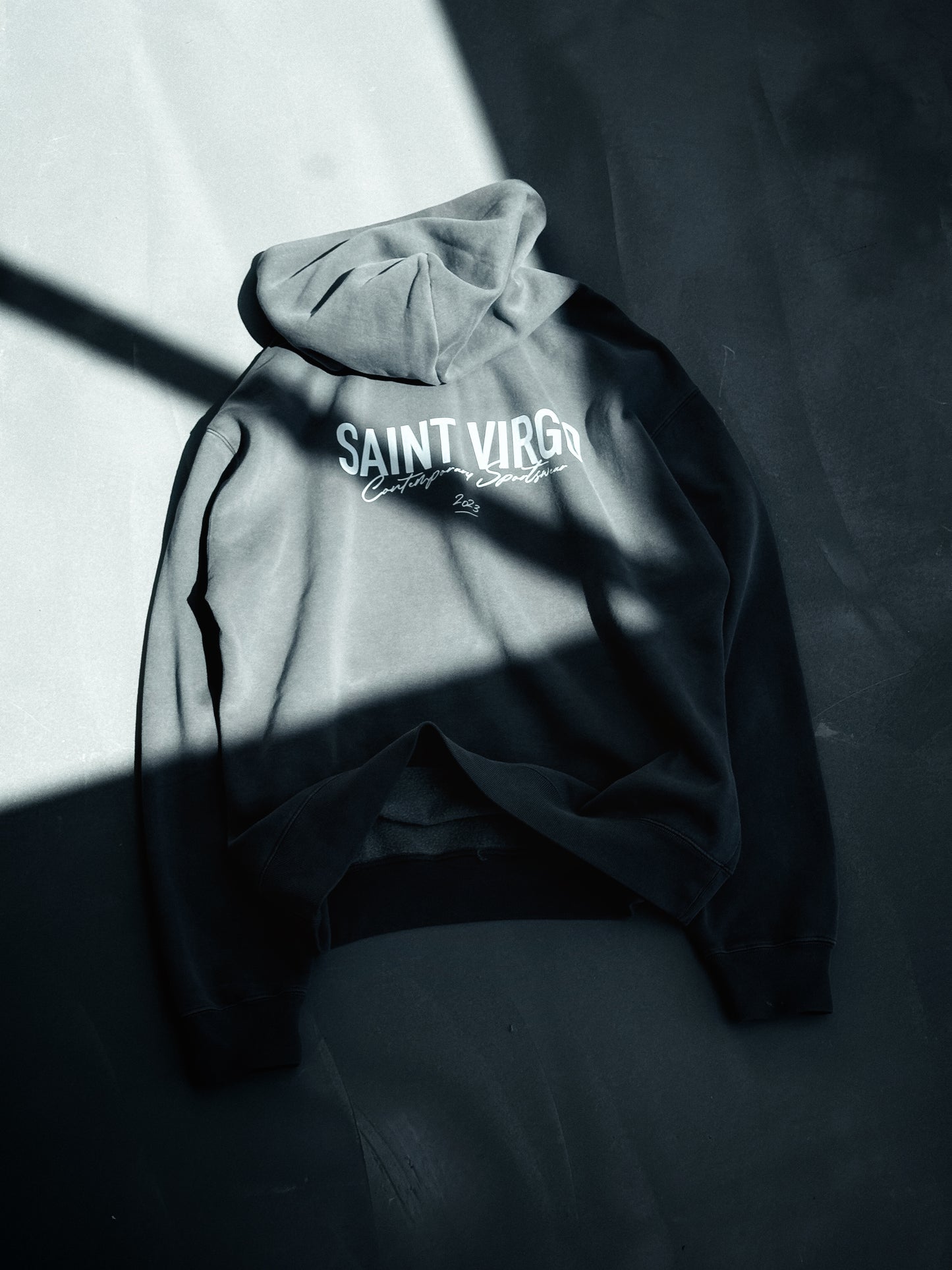 Saint Virgo Athlete Hoodie, designed for the modern athlete, offering contemporary sportswear with a focus on athletic essentialism. This ready-to-wear luxury sportswear piece is perfect for those redefining sportswear with style and performance.
