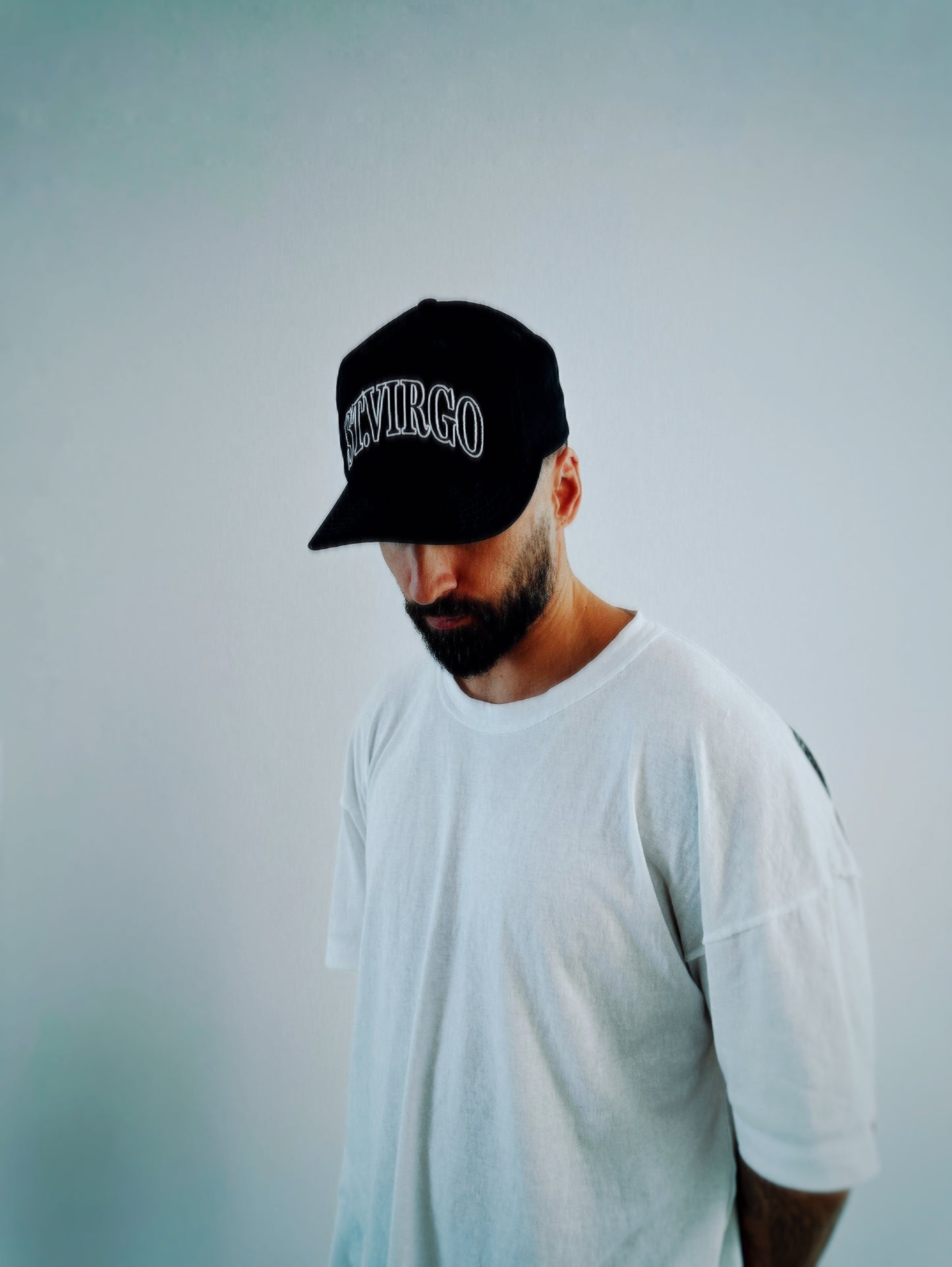 Saint Virgo Icon Cap, featuring ready-to-wear luxury sportswear with bold design elements, capturing athletic essentialism and redefining sportswear for those who embrace iconic, active lifestyles.