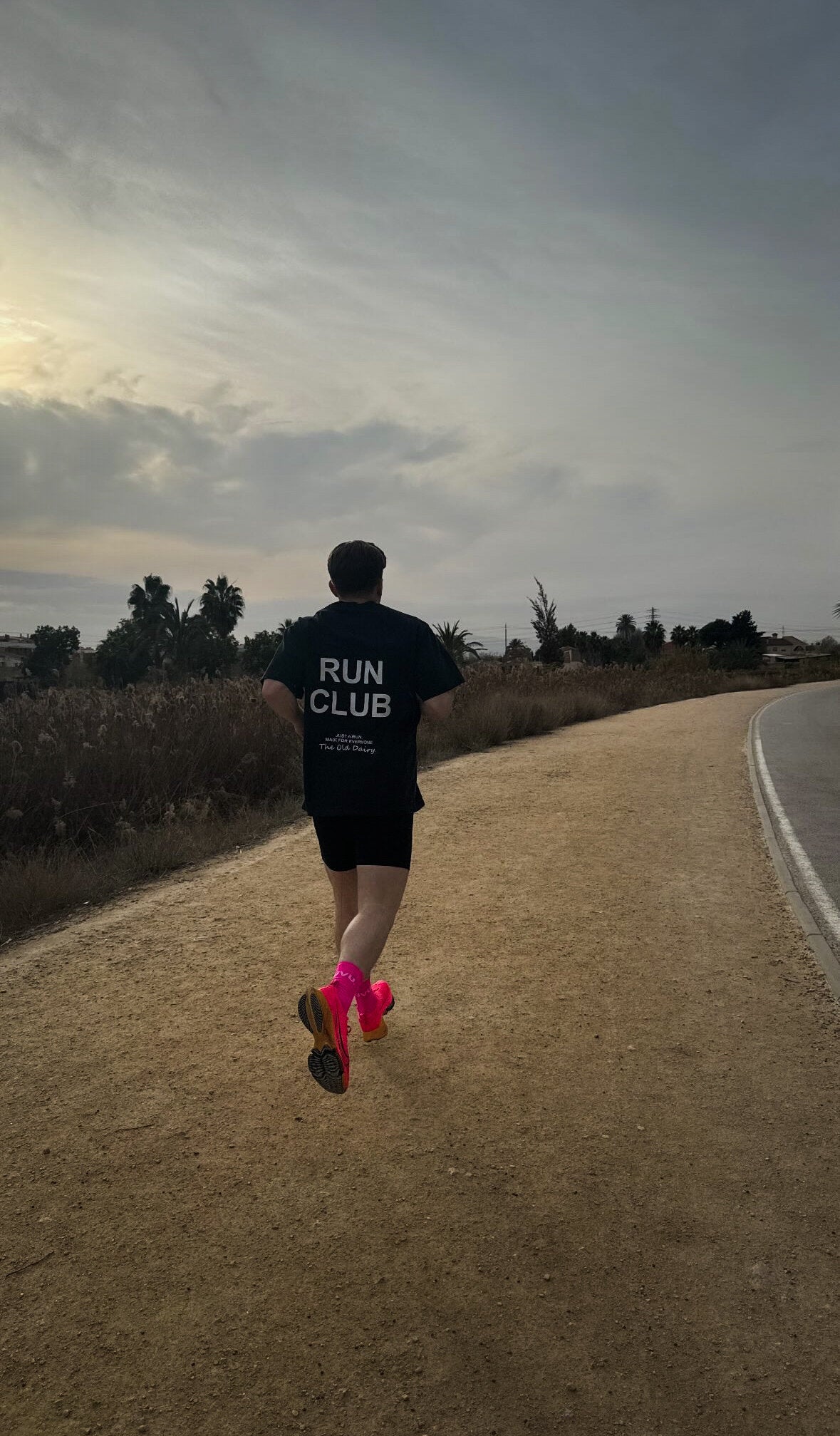 Saint Virgo Run Club T-shirt, crafted with contemporary sportswear design, offering ready-to-wear luxury sportswear for runners. This piece reflects athletic essentialism, providing comfort and performance while redefining sportswear for active, athletic lifestyles.